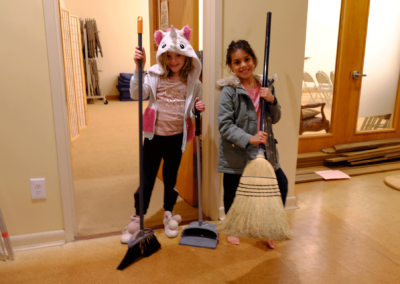 Children volunteering to sweep
